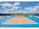 Well-kept pickleball courts with lighting in a beautiful community setting, great for active residents at 324 Coral Reef Way, Daytona Beach, FL 32124