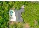 Aerial view of the house showing its expansive size and beautiful treed surroundings at 530 Estates Pl, Longwood, FL 32779