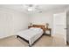 Bedroom features neutral carpet, ceiling fan and simple furnishings at 530 Estates Pl, Longwood, FL 32779