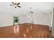 Large bonus room with hardwood floors, neutral walls, and bright light at 530 Estates Pl, Longwood, FL 32779