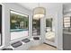 Bright breakfast nook with cushioned seating with views of the lanai and pool at 530 Estates Pl, Longwood, FL 32779
