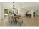 Inviting dining room with stylish furnishings, a modern chandelier, and lots of natural light at 530 Estates Pl, Longwood, FL 32779
