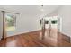 Spacious living room with vaulted ceiling, hardwood floors and natural light at 530 Estates Pl, Longwood, FL 32779