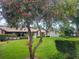 Charming home with a well-maintained lawn and mature trees at 75 Knollwood Estates Dr, Ormond Beach, FL 32174