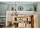 Modern kitchen features updated cabinets, backsplash, and stainless steel appliances at 75 Knollwood Estates Dr, Ormond Beach, FL 32174