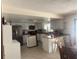 Inviting kitchen with modern appliances, a breakfast bar, and plenty of counter space at 2612 Umbrella Tree Dr, Edgewater, FL 32141
