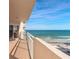 Balcony showcasing oceanfront views with white railings and a peek at the pool and beach at 2967 S Atlantic Ave # 708, Daytona Beach Shores, FL 32118