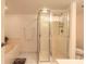 Bathroom featuring a soaking tub, step-in shower, and neutral tones at 2967 S Atlantic Ave # 708, Daytona Beach Shores, FL 32118