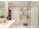 Bathroom featuring a soaking tub, shower, and ample lighting at 2967 S Atlantic Ave # 708, Daytona Beach Shores, FL 32118