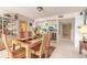 Open-concept dining room adjacent to kitchen and living room at 2967 S Atlantic Ave # 708, Daytona Beach Shores, FL 32118