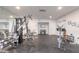 Spacious gym area featuring weight machines, free weights, and mirrored walls at 2967 S Atlantic Ave # 708, Daytona Beach Shores, FL 32118