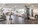 Well-equipped fitness center with a variety of exercise machines and natural light at 2967 S Atlantic Ave # 708, Daytona Beach Shores, FL 32118