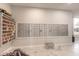 Indoor mailroom with tenant mailboxes, package drop and white marble floors at 2967 S Atlantic Ave # 708, Daytona Beach Shores, FL 32118