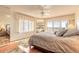 Bright main bedroom featuring hardwood floors, large windows, and neutral tones at 2967 S Atlantic Ave # 708, Daytona Beach Shores, FL 32118