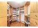 Spacious walk-in closet with custom shelving and ample storage space at 2967 S Atlantic Ave # 708, Daytona Beach Shores, FL 32118