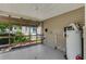 Outdoor screened in porch area perfect for enjoying fresh air and entertaining guests at 394 Golf Blvd, Daytona Beach, FL 32118