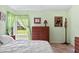 Bright bedroom featuring tile floors, natural light and comfortable furnishings at 4008 Acoma Dr, Ormond Beach, FL 32174