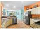 Well-equipped kitchen with granite countertops, stainless steel appliances, and easy access to the dining and living areas at 4008 Acoma Dr, Ormond Beach, FL 32174