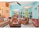Open-concept living room with a dining area, comfortable seating, and modern design at 4008 Acoma Dr, Ormond Beach, FL 32174
