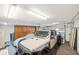 Spacious garage featuring ample storage cabinets and a modern, automatic door at 437 N Halifax Ave # 9, Daytona Beach, FL 32118