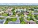 Beautiful aerial view of a lakeside community showcasing well-maintained homes and lush greenery at 518 Moon Rise Dr, Port Orange, FL 32127
