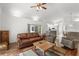 Living room with vaulted ceilings, hardwood floors, and easy access to the kitchen at 518 Moon Rise Dr, Port Orange, FL 32127