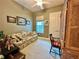 This is a bedroom with hardwood furniture, and a ceiling fan at 745 Aldenham Ln, Ormond Beach, FL 32174