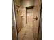 Custom tiled shower with neutral stone colored tile at 745 Aldenham Ln, Ormond Beach, FL 32174