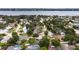 Charming neighborhood aerial view showcasing mature trees, well-maintained homes, and proximity to the water at 11 Larisa Ter, Ormond Beach, FL 32174