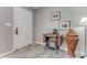 Inviting entryway with vintage sewing table, stylish decor, and tile flooring at 11 Larisa Ter, Ormond Beach, FL 32174