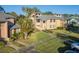 Beautifully landscaped townhouse with well-maintained lawns, trimmed hedges, and inviting curb appeal at 133 Blue Heron Dr # C, Daytona Beach, FL 32119