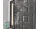Elegant black front door with sidelight, enhancing curb appeal and natural light at 133 Blue Heron Dr # C, Daytona Beach, FL 32119
