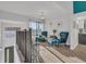 Bright living area with wood floors, comfortable seating, and a view of the outdoors at 133 Blue Heron Dr # C, Daytona Beach, FL 32119