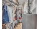 A walk-in closet with a metal rack shelving, shoe rack, and an AC unit at 133 Blue Heron Dr # C, Daytona Beach, FL 32119