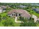 Expansive single Gathering home with lush landscaping and beautiful curb appeal in a private community at 1357 Liam Cir, Ormond Beach, FL 32174