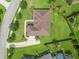 Stunning aerial view of a home with lush landscaping and manicured lawn at 1357 Liam Cir, Ormond Beach, FL 32174