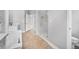 Modern bathroom with dual vanity, glass shower and separate toilet at 1357 Liam Cir, Ormond Beach, FL 32174