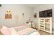 Charming bedroom decorated with a vanity, decorative items, and a comfortable bed at 1357 Liam Cir, Ormond Beach, FL 32174