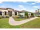 Inviting single Gathering home with a well-maintained lawn and walkway at 1357 Liam Cir, Ormond Beach, FL 32174