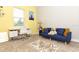 This office space features a comfy futon, a desk, and natural lighting at 1357 Liam Cir, Ormond Beach, FL 32174