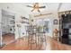 View of the kitchen nook featuring a ceiling fan and table for four at 2 Wildwood Dr, Edgewater, FL 32132