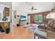 View of the living room featuring wood flooring, ceiling fan, and neutral walls at 2 Wildwood Dr, Edgewater, FL 32132