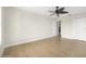 Spacious bedroom with tile flooring and ceiling fan at 3074 Ocean Shore Blvd, Ormond Beach, FL 32176