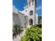 Inviting home entrance with lush greenery and a charming walkway at 3074 Ocean Shore Blvd, Ormond Beach, FL 32176