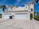 Charming two-story home featuring a two-car garage and well-maintained landscaping at 3074 Ocean Shore Blvd, Ormond Beach, FL 32176