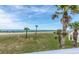 Enjoy stunning ocean views from this home with beautiful palm trees and a well-maintained lawn at 3074 Ocean Shore Blvd, Ormond Beach, FL 32176