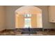Kitchen pass-through view to living area at 3076 Ocean Shore Blvd, Ormond Beach, FL 32176