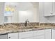 Kitchen sink and granite counter at 3076 Ocean Shore Blvd, Ormond Beach, FL 32176