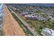 Beautiful aerial view of condo complex and beach with easy access to shops and local restaurants at 3370 Ocean Shore Blvd # 205-B, Ormond Beach, FL 32176