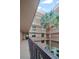Balcony view featuring a courtyard with lush tropical landscaping at 3370 Ocean Shore Blvd # 205-B, Ormond Beach, FL 32176